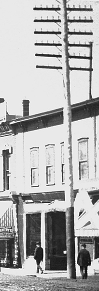 The facia of Congress Hall. The Janowitz store was located on the ground floor at the right side of this structure at 519 Harrison Avenue. “Cigars” is faintly seen on the window to the right of the utility pole.