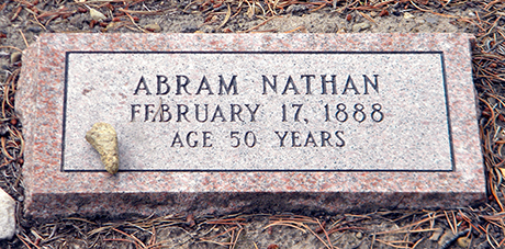 Modern grave marker stating “Abram Nathan. February 17, 1888. Age 50 Years”
