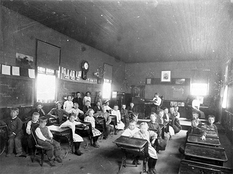 Oro City School class in classroom, 29 children, 2 teachers.