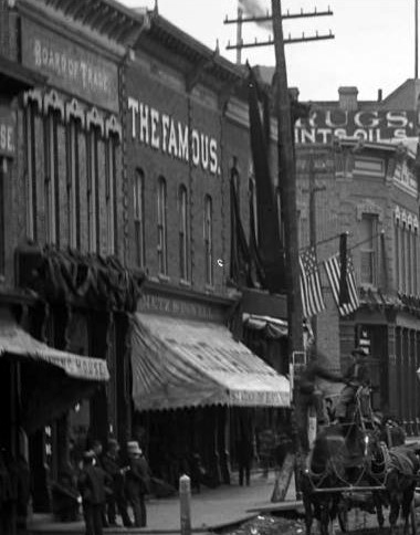 “The Famous” Boot and Shoe store at 317 Harrison Avenue in 1884 or 1885.