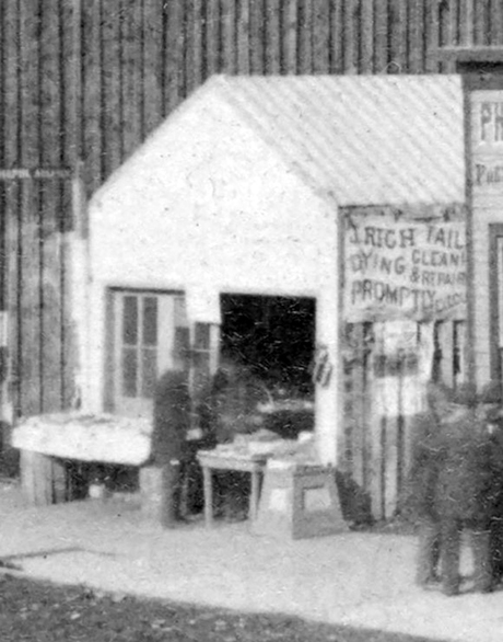 Detail of photograph showing the building for J Rich Tailoring, circa 1881, in Leadville, Colorado.  