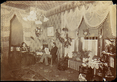 Interior photo of the parlour in the home belonging to Adolph and Mathilda Baer located at 315 West 8th Street, circa 1884.