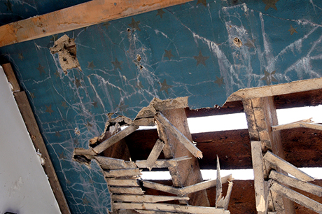 Remnants discovered in 2007 of the original stars on the plaster and lathe ceilings and walls allowed for creating stencils for the restoration.