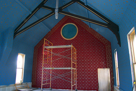 The back red wall with the design stenciling is complete. The field has a silver metallic painted design, while the border has a gold metallic painted design.